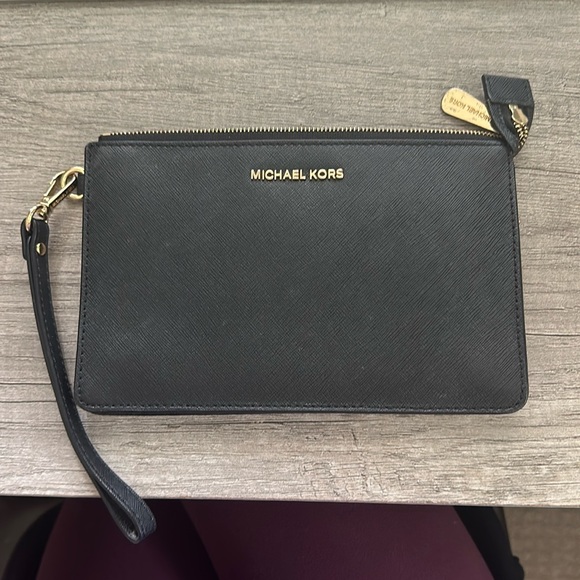 Michael Kors Handbags - Black saffiano leather Michael Kors wristlet. Like new!